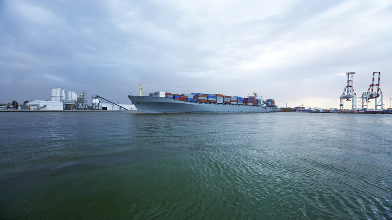 Container ship preparing to dock